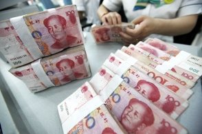 去年我国人民币贷款增加18.09万亿元——信贷结构持续优化，社会融资成本下降